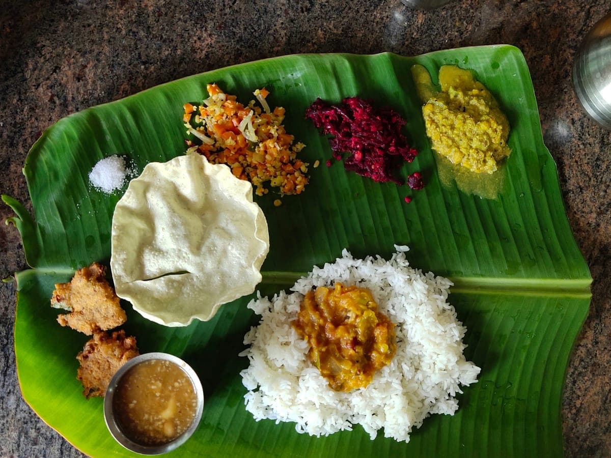 Traditional South Indian meal served on a banana leaf